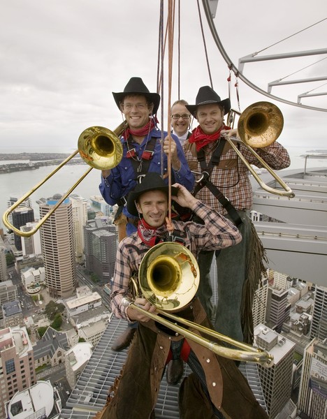 Members of trombone quartet BonaNZa and their conductor Marc Taddei, all dressed in full costume, braved the Sky Walk yesterday